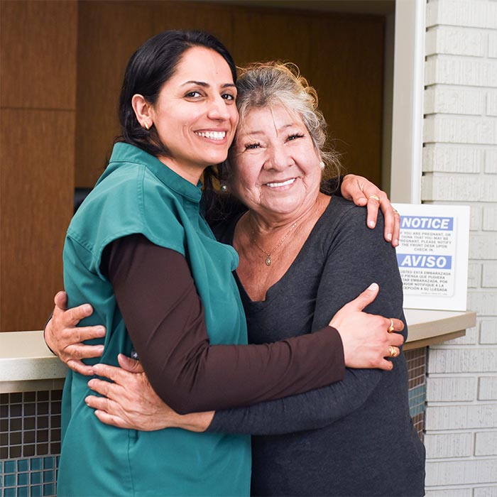 Dr Purnima Sheoran DDS - Santa Maria Dentist Mai Dental Care with patient smiling